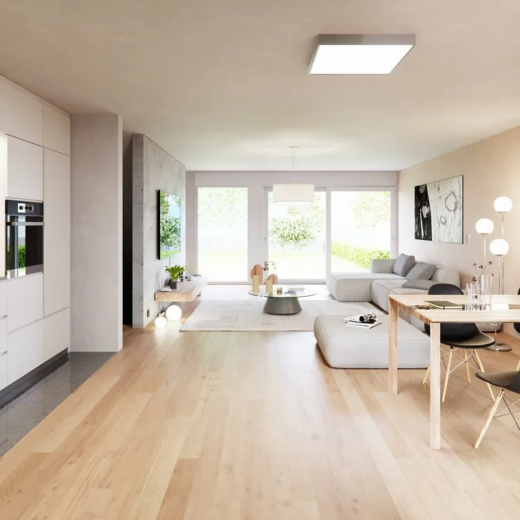 Spacious open-plan living and dining area with light wood floors and modern Scandinavian-style furnishings.