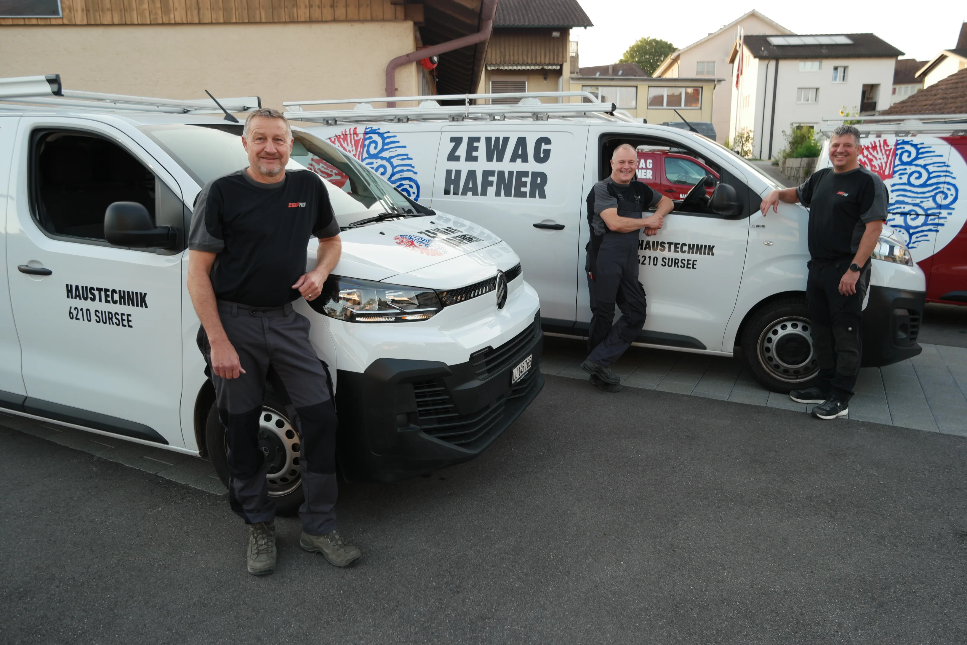 A confident ZEWAG Hafner employee portrait conveying the human expertise and trustworthiness behind 50 years of quality craftsmanship in Sursee.