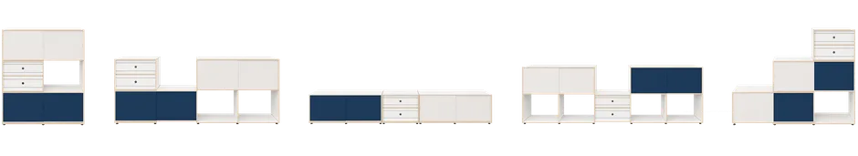 Modular sideboard combining white and navy blue panels with natural birch plywood edges against a white brick wall.